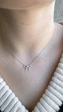Load image into Gallery viewer, 14K Gold and Diamond Bow Necklace With Full Cut Center
